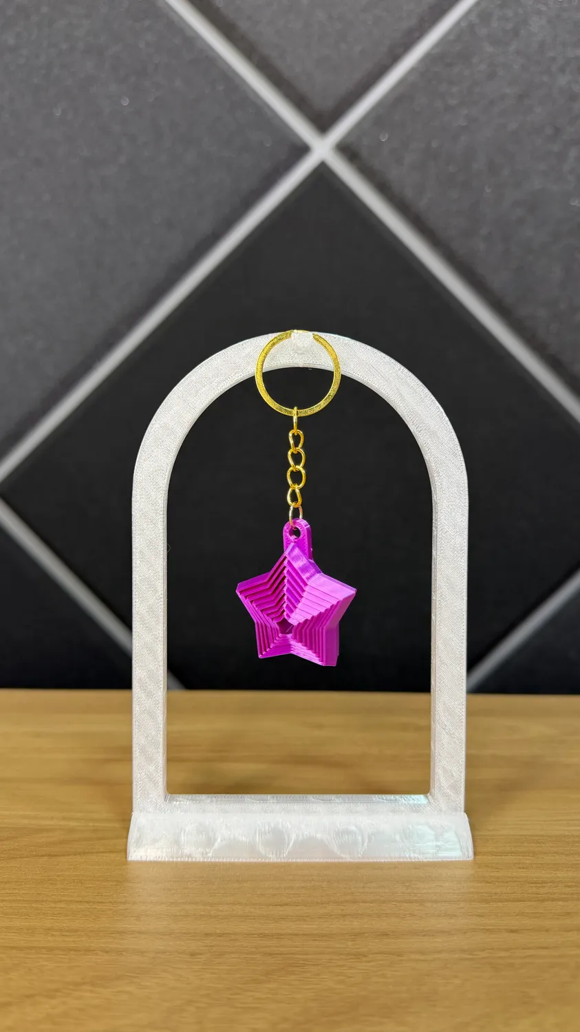 Chaveiro fidget de estrela rosa impresso em 3D
